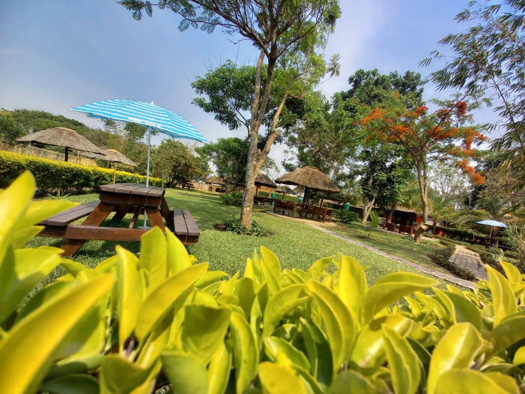 Garden tables and gazebos across the Kumudzi Innovation Centre grounds